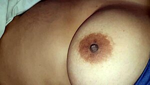 Squeezing Step-Mom's Big Nipples