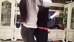 Stunning Chinese girl Michiel dances in tight leather pants