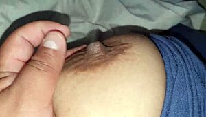 Squeezing Step-Mom's Big Nipples