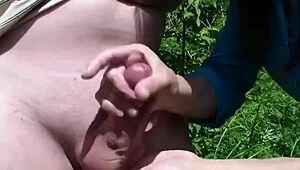 Sexy milf Frina undresses young guy outdoors for taboo jerk off