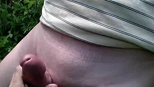 Sexy milf Frina undresses young guy outdoors for taboo jerk off