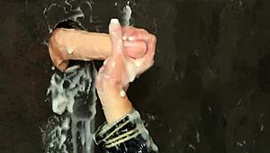 A blonde European woman gets a facial in a gloryhole scene