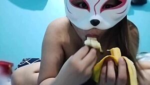 Busty filipina babe enjoys fruit fetish with banana.