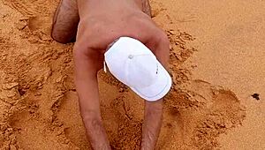 Hot gay Latino guy shows off his ass on the beach in solo scene