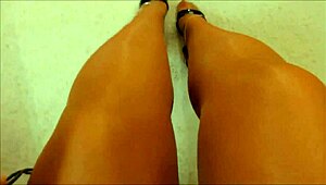 Hot curvy milf moans intensely while stroking cock in tan pantyhose and high heels from pov