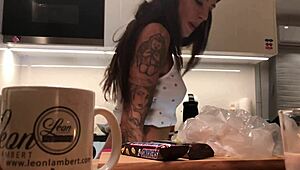 young amateur wife caught on voyeur cam while doing dishes