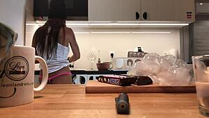 young amateur wife caught on voyeur cam while doing dishes