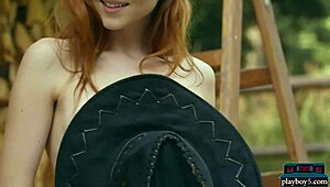 Tiny redhead strips naked for outdoor solo session
