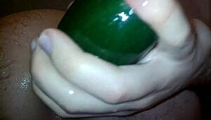 gay guy experiments with a vegetable in the shower