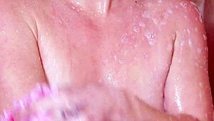 Charming Brunette Model Strips and Showers for Photoshoot