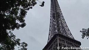 Extreme public threesome orgy under the Eiffel Tower in Paris with risky fucking.