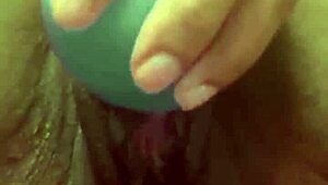 This amateur girl pumps her swollen pussy with a vibrator