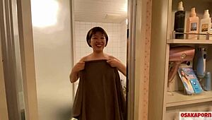 g-cup japanese babe with short hair does titty fuck in shower.