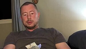 Flexible guy masturbates with plug