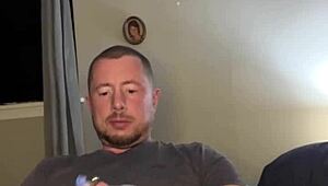 Flexible guy masturbates with plug