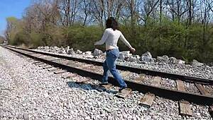 Beautiful brunette MILF shows off her big ass in public