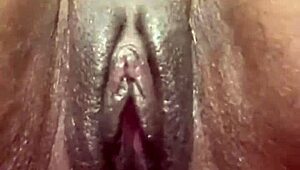 This amateur girl pumps her swollen pussy with a vibrator