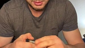 Flexible guy masturbates with plug