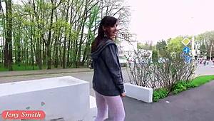 jeny smith flashes her sporty white pantyhose outdoors, showing nude legs and ass.