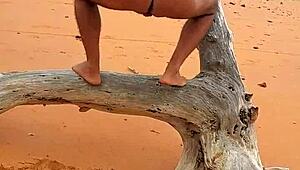 LadySILVA shows off her gay ass on the beach in this solo scene