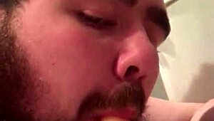 young gay chub enjoys sucking and riding his dildo