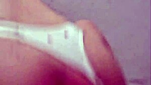 Brazilian babe rips her pussy open swallowing a thick rubber cock in solo play.