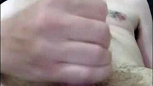 Cute Redhead Strokes Cock Solo for Facial Cumshot