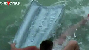 Beach Voyeur Catches Lucky Guy Getting Sucked Off on Air Mattress