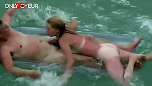 Beach Voyeur Catches Lucky Guy Getting Sucked Off on Air Mattress