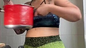 married woman records cooking videos to flash her pussy online