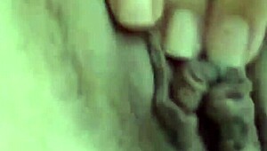 Submissive amateur woman masturbates her pussy in a public setting. Revealing her big ass and tattooed tits