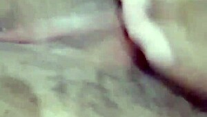 Hot milf teases with solo fingering of her wet pussy in steamy lingerie