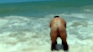 Young blonde gives a good blow job and gets a creampie on the beach