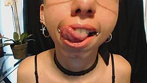 Drooling over nude lipstick with wet tongue