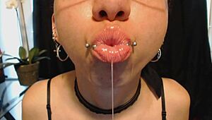 Drooling over nude lipstick with wet tongue