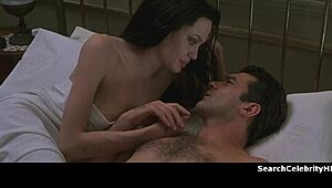 Angelina Jolie showing off her tits in bed during Original Sin scene