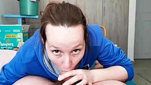 brunette in hoodie skillfully sucking cock in a cute homemade video.