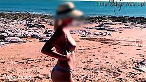 wifey flashing her big tits at the beach in sexy bikini