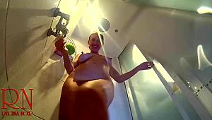 Hidden camera captures young naked girl stripping in shower room