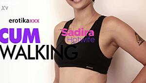 Sadira teases with tattooed body and big cock flashing