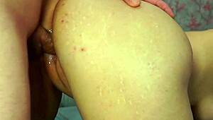 Couple tries doggystyle pose with cum on pretty face