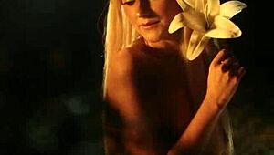 Petite blonde Eva Elfie reveals stunning body while posing in a sexy costume.