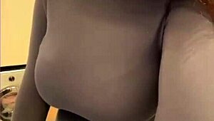 My milky stepmom teases by licking her own nipples—what a wild, tempting sight to see.