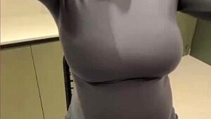 My milky stepmom teases by licking her own nipples—what a wild, tempting sight to see.