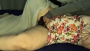 A hot MILF shares a bed with her son