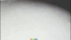 Beautiful college student in uniform, passionately kissing boyfriend