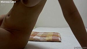 Japanese beauty strips nude on webcam, showing natural tits and ass.