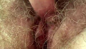Wow, watch me stroke my hairy pussy till I explode!