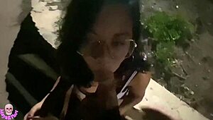 A sexy woman dances seductively in the park