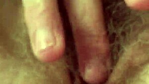 Wow, watch me stroke my hairy pussy till I explode!